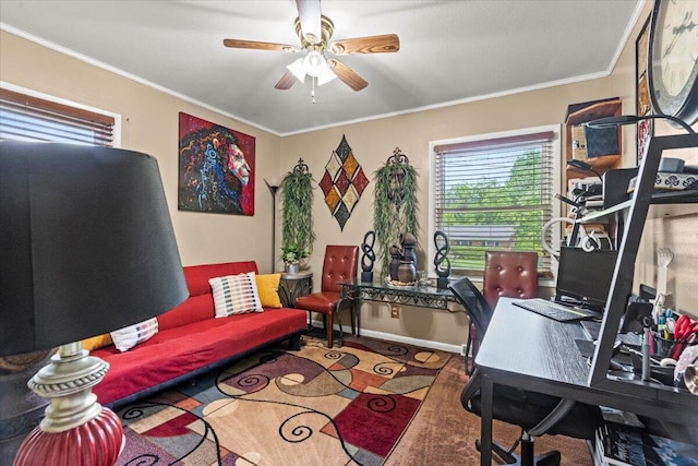 home office with a ceiling fan, ornamental molding, and baseboards
