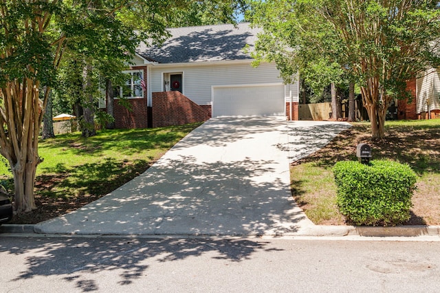 4690 Red Leaf Way, Augusta, GA 30907 - view of front of property featuring brick siding, concrete driveway, an attached garage, and a front yard