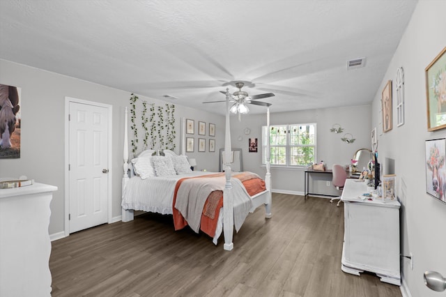 4690 Red Leaf Way, Augusta, GA 30907 - bedroom with light wood-type flooring, baseboards, a ceiling fan, and a textured ceiling