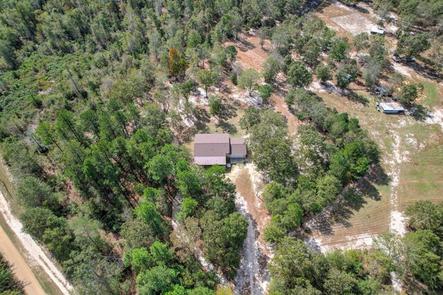 birds eye view of property with a rural view