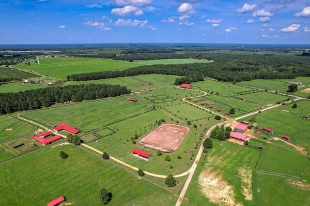 birds eye view of property with a rural view