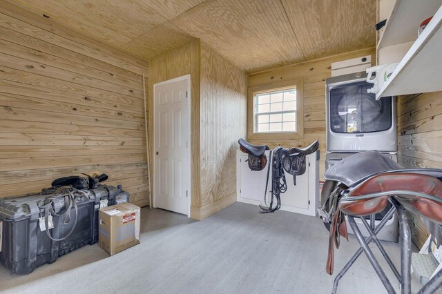 miscellaneous room with wooden ceiling and wood walls