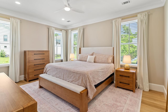 636 Railroad Ave, North Augusta, SC 29841 - bedroom with crown molding, light wood-style floors, baseboards, ceiling fan, and recessed lighting