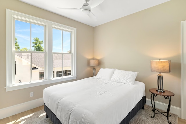 636 Railroad Ave, North Augusta, SC 29841 - bedroom featuring baseboards, wood finished floors, and ceiling fan