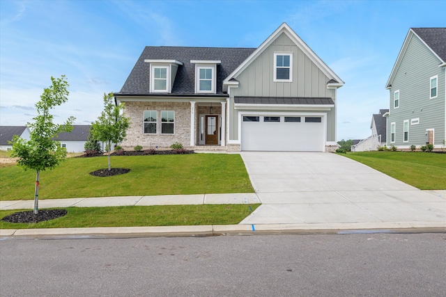 856 Whitney Shoals Rd, Evans, GA 30809 - craftsman inspired home featuring board and batten siding, concrete driveway, an attached garage, and a front lawn