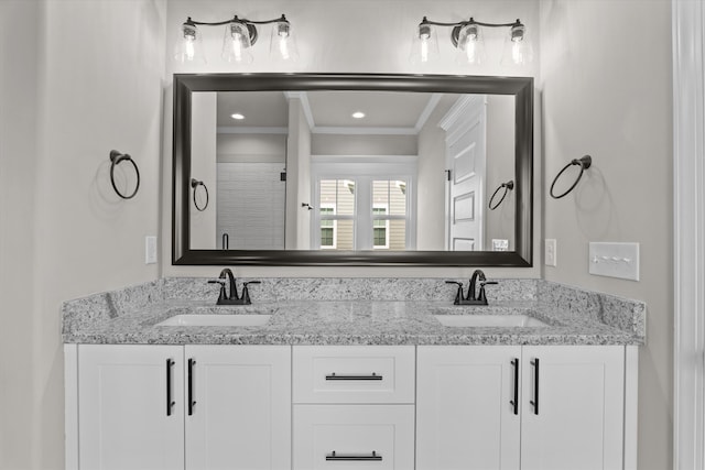 856 Whitney Shoals Rd, Evans, GA 30809 - bathroom with crown molding, double vanity, and a shower with door