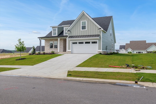 856 Whitney Shoals Rd, Evans, GA 30809 - craftsman-style house featuring board and batten siding, a garage, driveway, a front yard, and roof with shingles