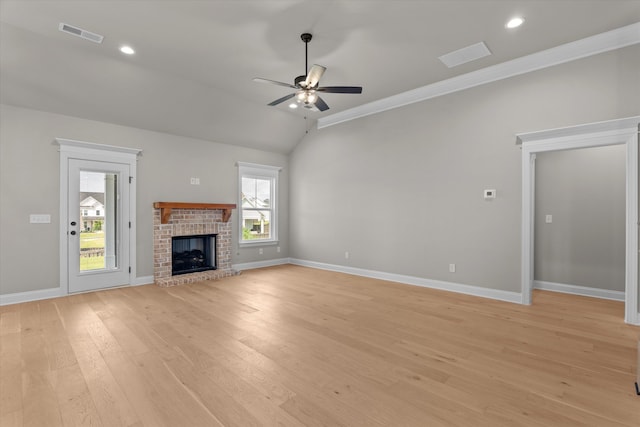 856 Whitney Shoals Rd, Evans, GA 30809 - unfurnished living room with baseboards, ceiling fan, a brick fireplace, light wood-type flooring, and crown molding