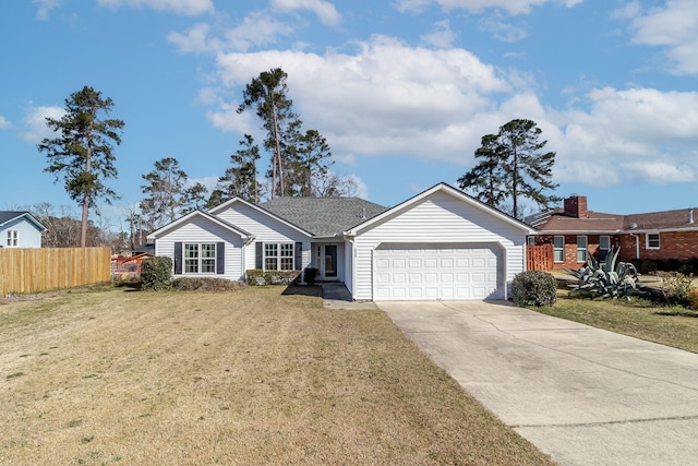 ranch-style home with a front yard, concrete driveway, fence, and an attached garage