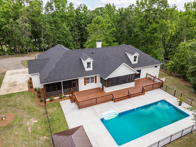 473 Sugarcreek Dr, Grovetown, GA 30813 - view of swimming pool with a sunroom and a wooden deck