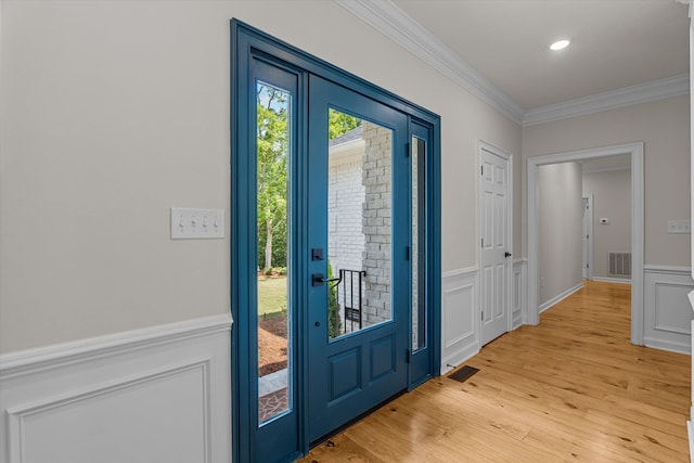 473 Sugarcreek Dr, Grovetown, GA 30813 - entryway featuring crown molding, light wood-type flooring, wainscoting, a decorative wall, and recessed lighting
