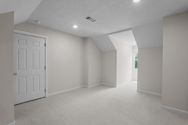 473 Sugarcreek Dr, Grovetown, GA 30813 - additional living space with vaulted ceiling, baseboards, carpet floors, recessed lighting, and a textured ceiling