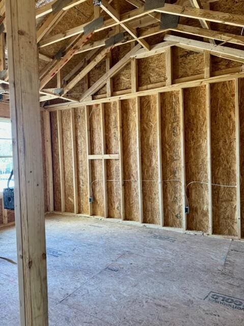 miscellaneous room featuring lofted ceiling