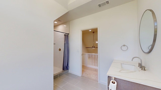 122 Ehrlich Farm Rd, Swainsboro, GA 30401 - bathroom featuring a shower with shower curtain, double vanity, and tile patterned flooring