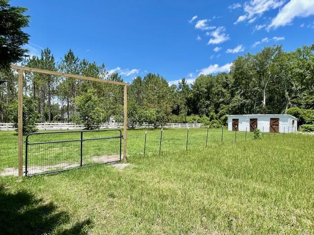 122 Ehrlich Farm Rd, Swainsboro, GA 30401 - view of yard featuring a rural view