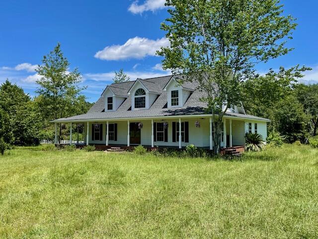 122 Ehrlich Farm Rd, Swainsboro, GA 30401 - farmhouse featuring a porch