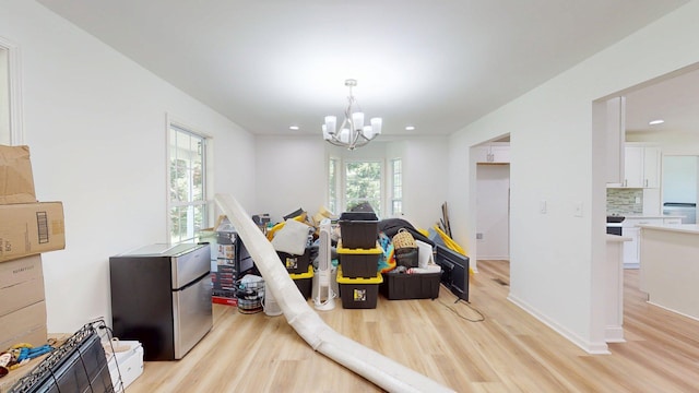 122 Ehrlich Farm Rd, Swainsboro, GA 30401 - recreation room with light wood-style flooring, a chandelier, and recessed lighting