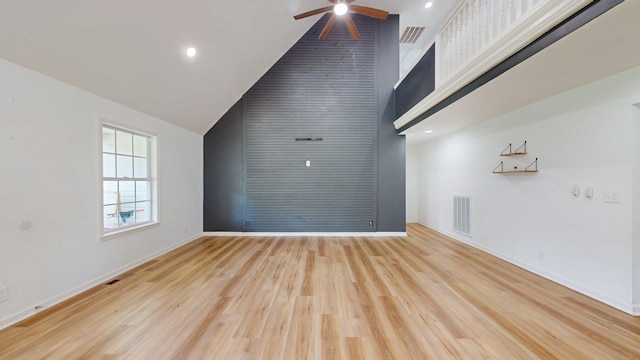 122 Ehrlich Farm Rd, Swainsboro, GA 30401 - unfurnished living room with ceiling fan, high vaulted ceiling, wood finished floors, and recessed lighting