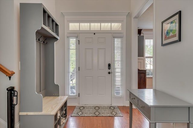 entryway featuring light wood-type flooring and baseboards