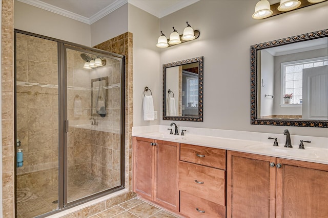 full bathroom featuring a shower stall, crown molding, and double vanity