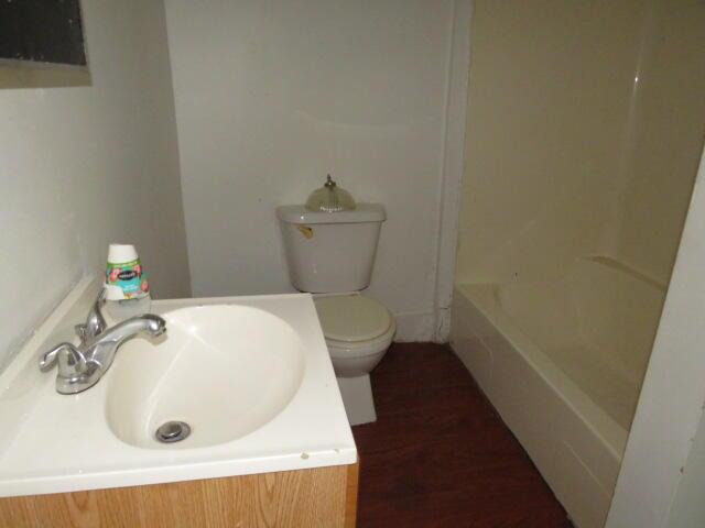 1916 Walker St, Augusta, GA 30904 - full bath featuring wood finished floors and vanity