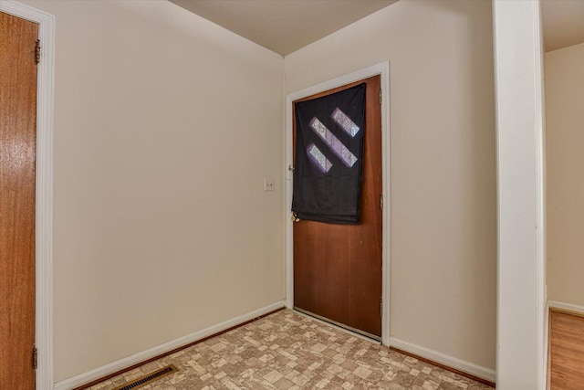 413 Dixie Dr, Thomson, GA 30824 - entryway with light flooring and baseboards