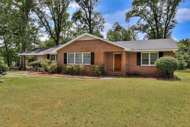 ranch-style house with a front lawn