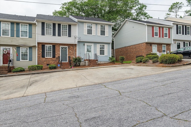 2116 Gary St, Augusta, GA 30904 - view of property featuring entry steps, uncovered parking, and brick siding