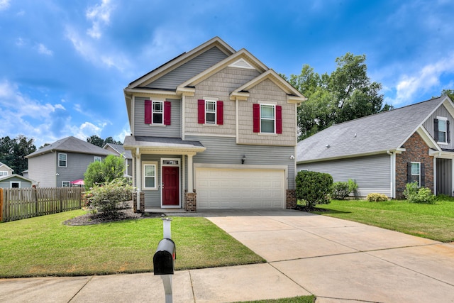 craftsman-style home featuring a garage and a front yard