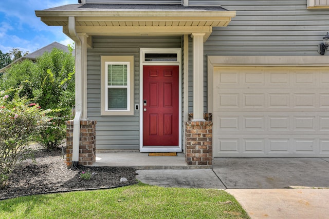 entrance to property featuring a garage