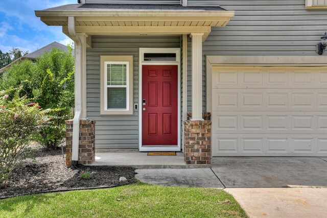 entrance to property featuring a garage