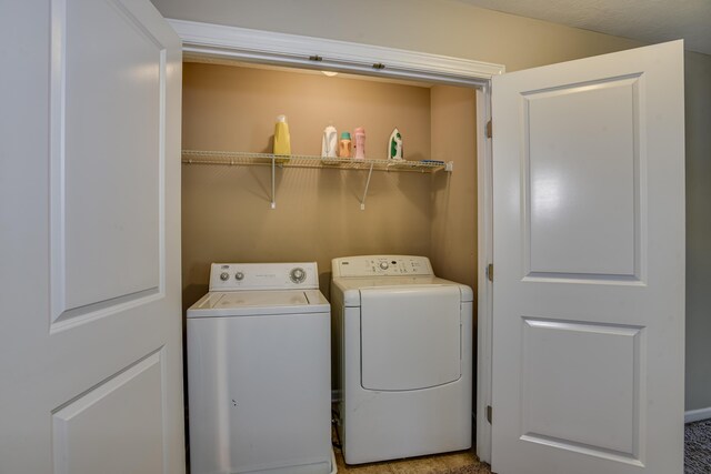 laundry area with washer and dryer