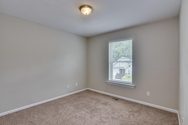 empty room featuring carpet