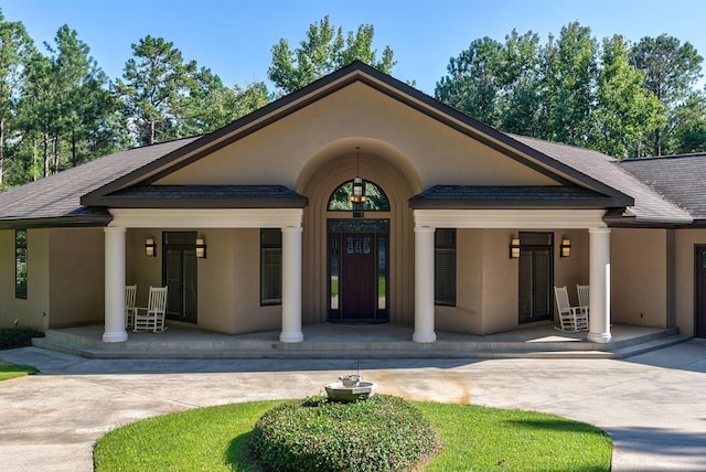 view of front of home featuring covered porch