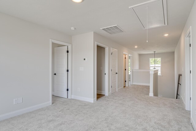 1663 Pine Ridge Dr N, Hephzibah, GA 30815 - spare room with attic access, carpet flooring, recessed lighting, baseboards, and a smoke detector