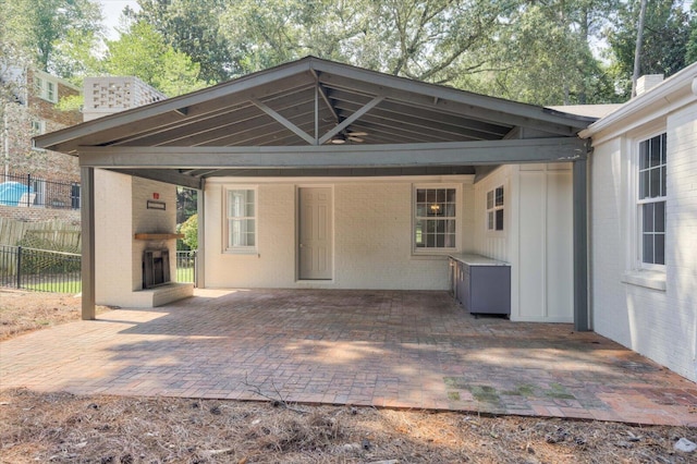 2911 Lombardy Ct, Augusta, GA 30909 - rear view of house with brick siding and a patio