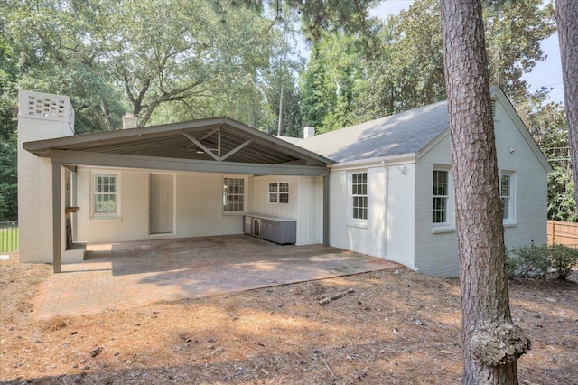 2911 Lombardy Ct, Augusta, GA 30909 - rear view of property featuring a chimney and brick siding