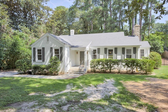 2911 Lombardy Ct, Augusta, GA 30909 - single story home featuring a chimney, a front lawn, and view of scattered trees