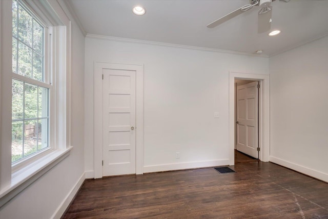 2911 Lombardy Ct, Augusta, GA 30909 - empty room featuring healthy amount of natural light, crown molding, a ceiling fan, recessed lighting, and dark wood-style flooring