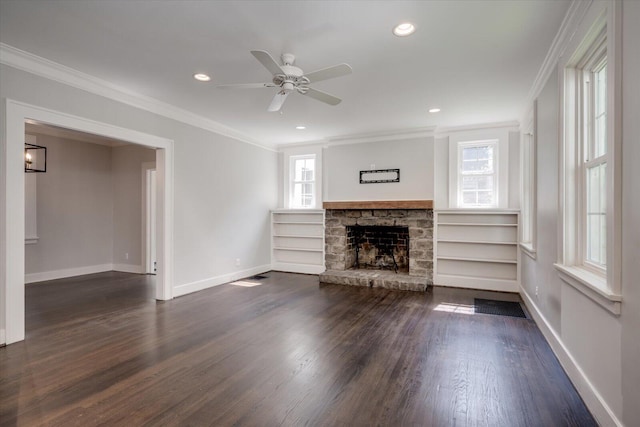 2911 Lombardy Ct, Augusta, GA 30909 - unfurnished living room featuring crown molding, ceiling fan, dark wood finished floors, a stone fireplace, and recessed lighting