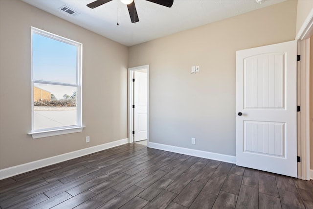 unfurnished room with ceiling fan