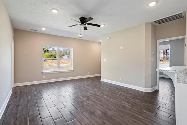 spare room with ceiling fan