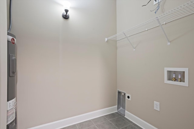 laundry area featuring hookup for a washing machine, hookup for an electric dryer, and tile patterned floors