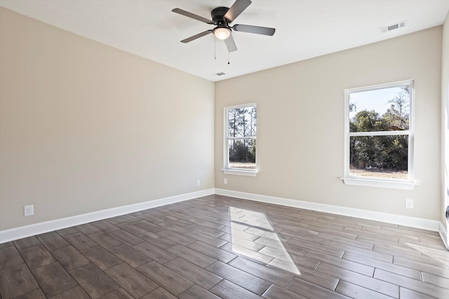 empty room featuring ceiling fan