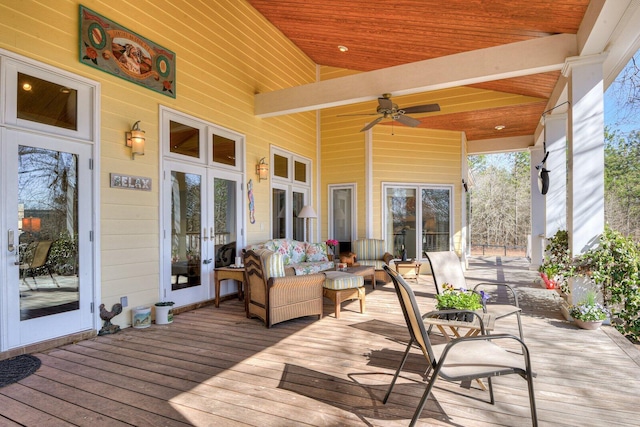 wooden terrace with french doors and ceiling fan