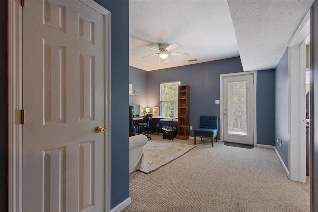3933 High Chaparral Dr, Martinez, GA 30907 - carpeted living room with a desk, ceiling fan, and baseboards