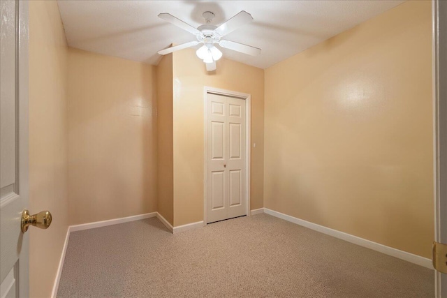 3933 High Chaparral Dr, Martinez, GA 30907 - empty room featuring light carpet, a ceiling fan, and baseboards