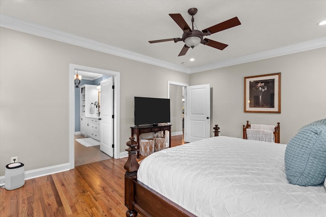 bedroom featuring crown molding, recessed lighting, baseboards, and wood finished floors