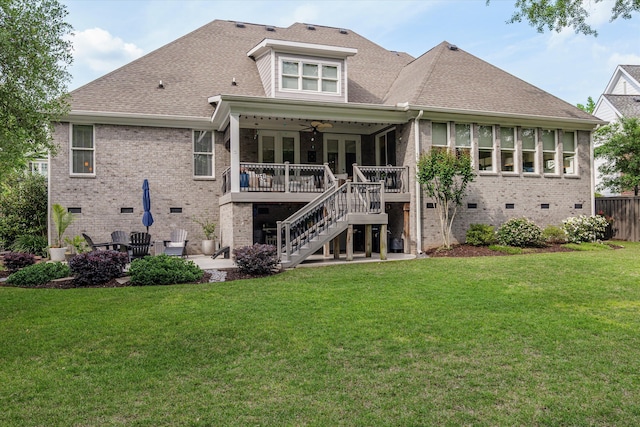 rear view of house with a patio, brick siding, stairway, and a deck