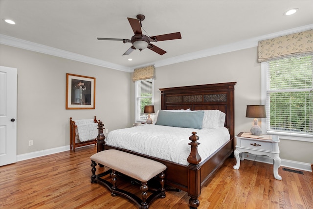 bedroom featuring crown molding, recessed lighting, baseboards, and light wood-style flooring